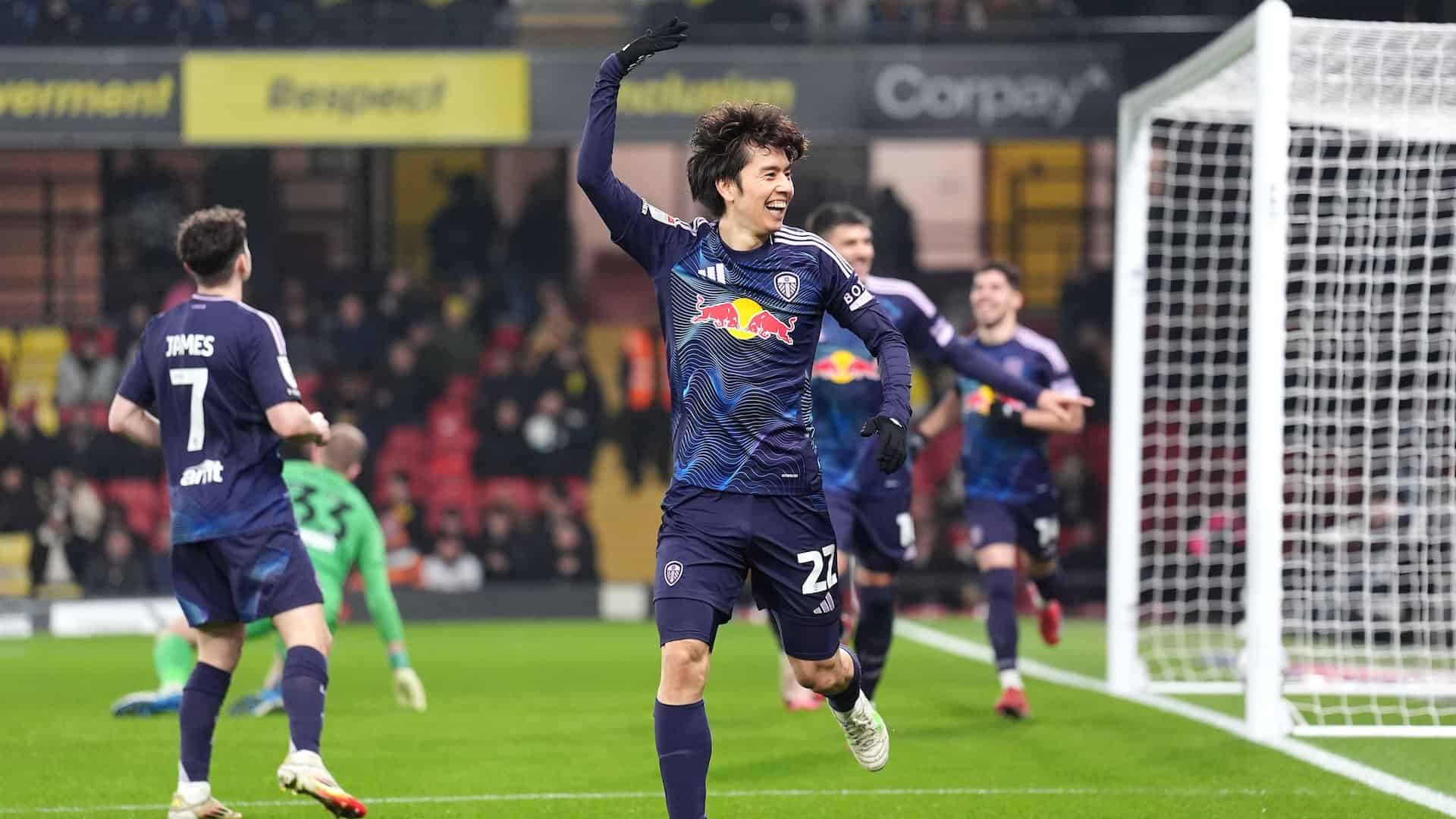 Ao Tanaka doing a funky little dance or something in front of the Leeds away end at Watford