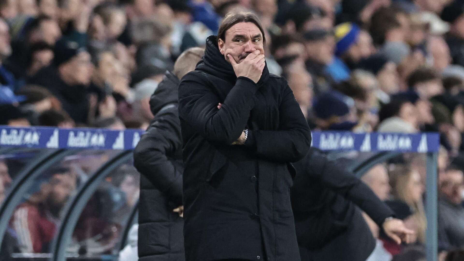 Daniel Farke stands on the touchline against Arsenal with his hand covering his mouth, looking like we were all feeling