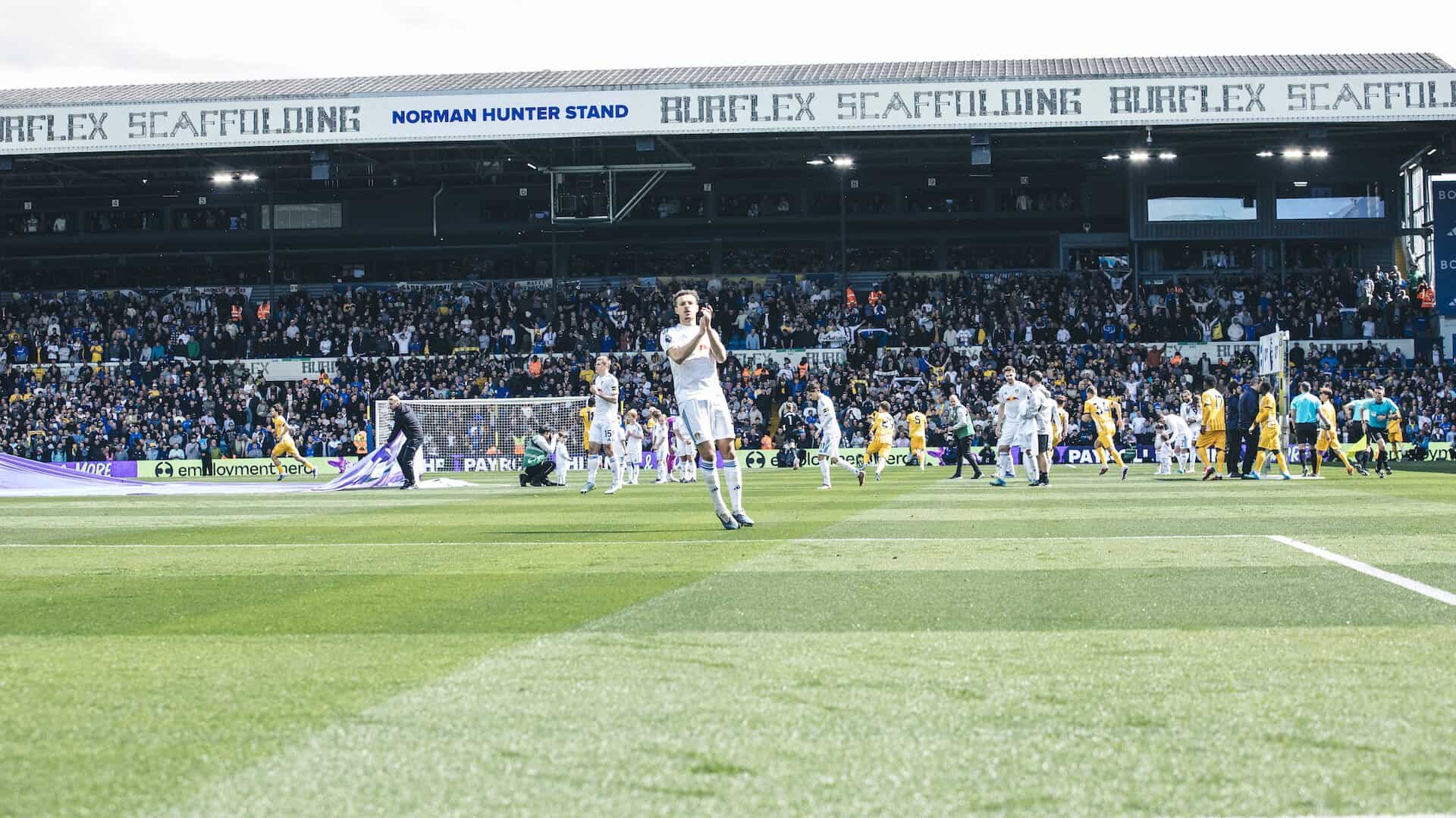 Ethan Ampadu applauding the Kop ahead of kick off against Brighton with the, erm, lively South Stand in the background