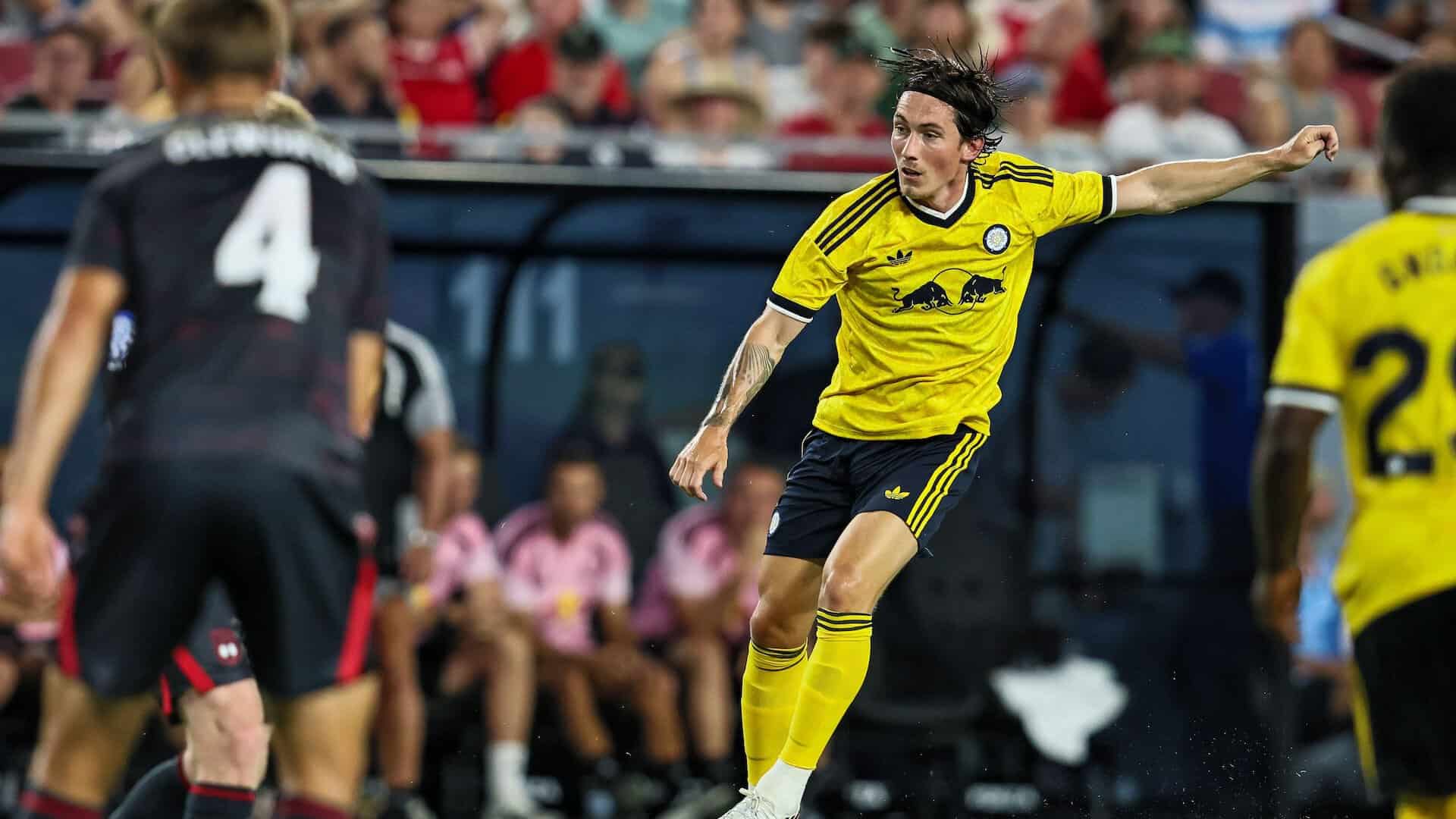 Harry Wilson taking a shot on his first outing for Leeds against Wrexham. The new away kit looks ace