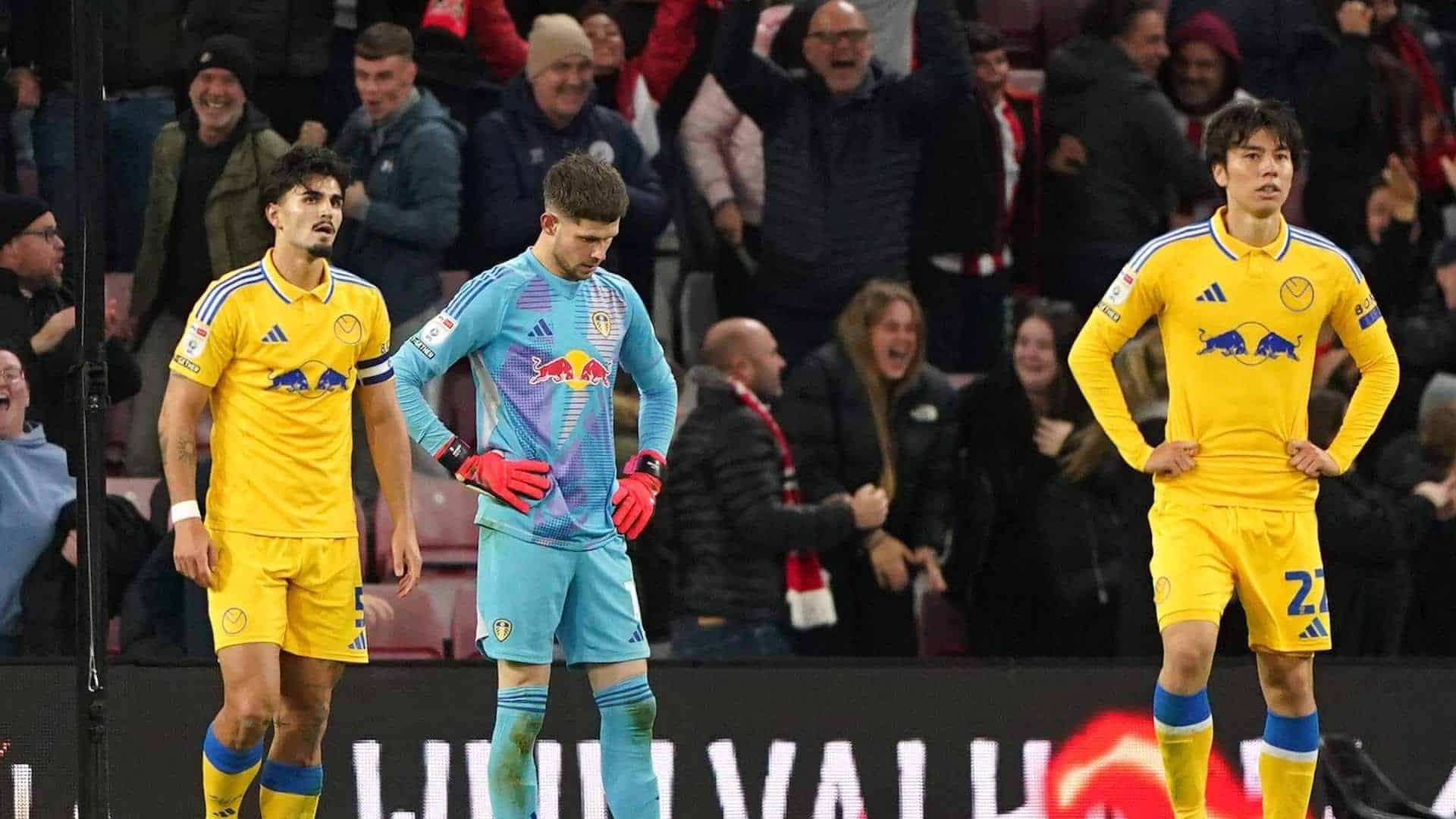 Illan Meslier looking at the floor after his mistake at Sunderland, with Pascal Struijk and Ao Tanaka trying not to look at him