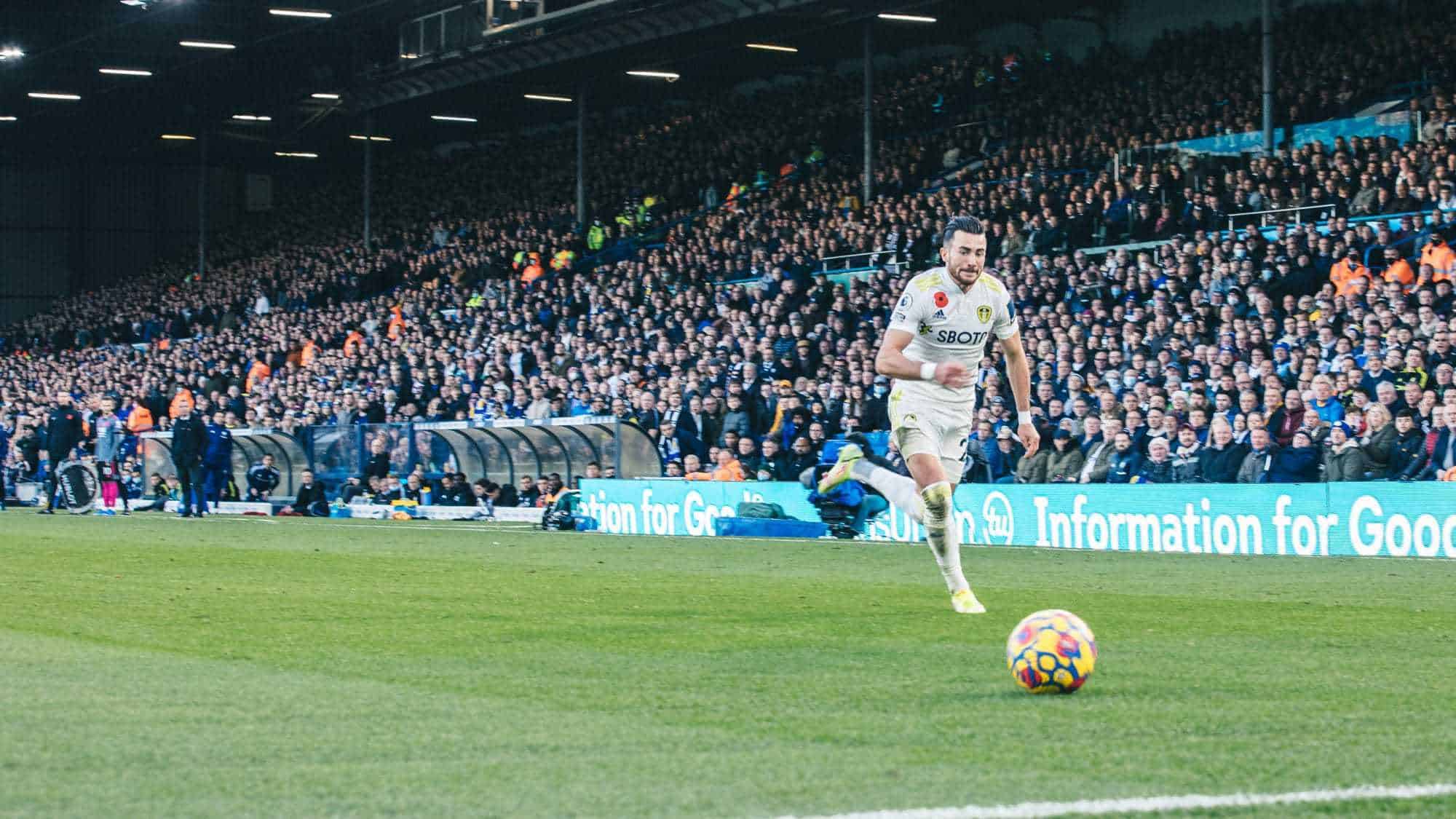 Jackie Harrison running to keep the ball in play against Leicester