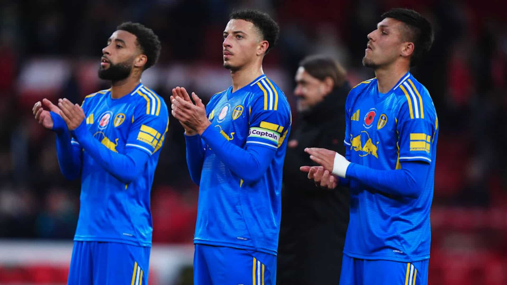 Jayden Bogle, Ethan Ampadu and Joel Piroe sheepishly applauding the away end at the City Ground with Daniel Farke hiding in the background, not helping matters