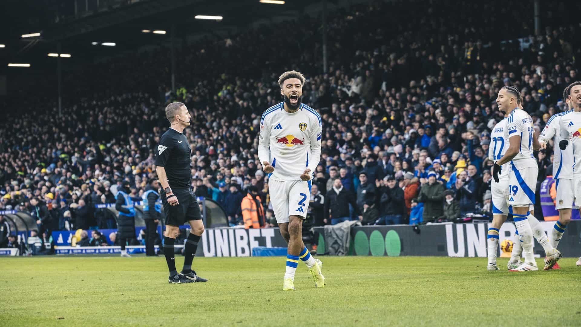 Jayden Bogle geeing up the Leeds crowd in the Kop after Largie Ramazani's goal against Sheffield Wednesday