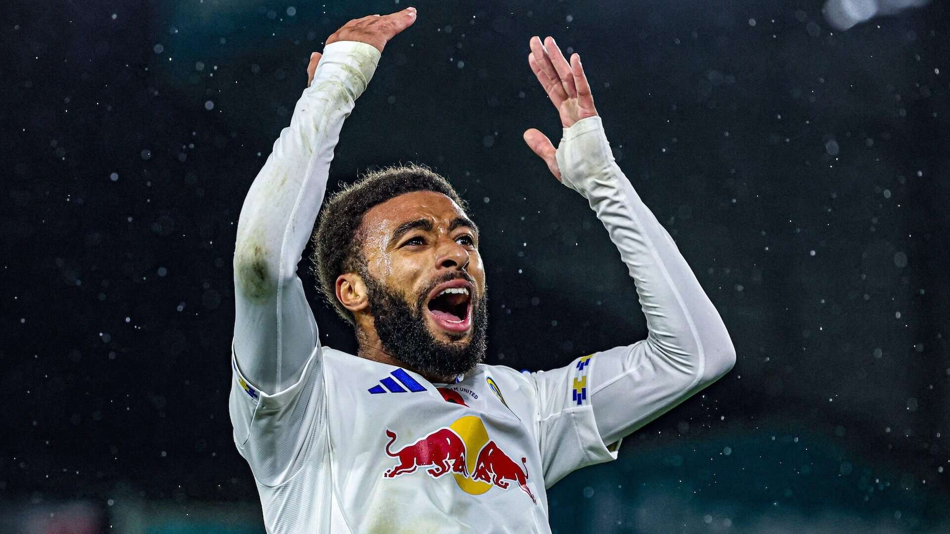 Jayden Bogle revving up the south stand after Leeds United won a corner at Elland Road against West Ham