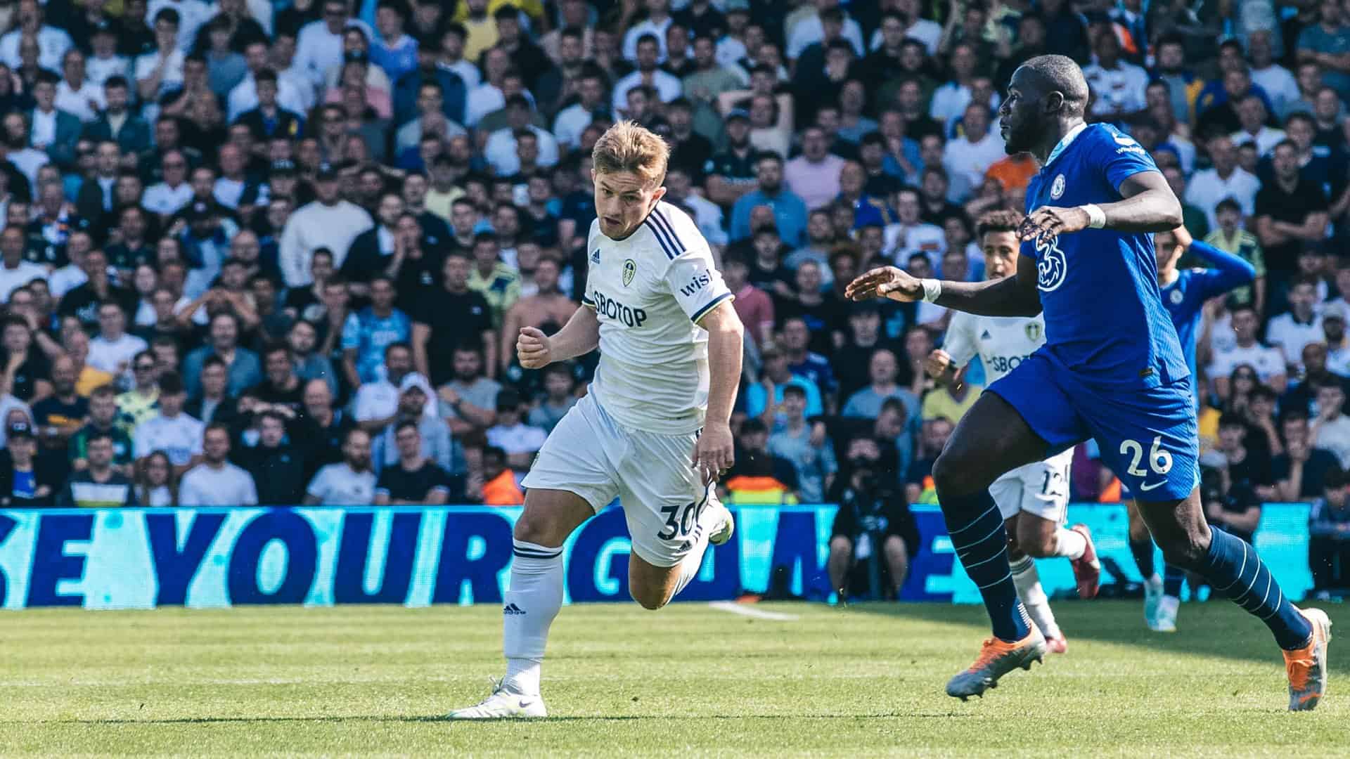 A photo of Joe Gelhardt sprinting past Chelsea's Kalidou Koulibaly earlier this season