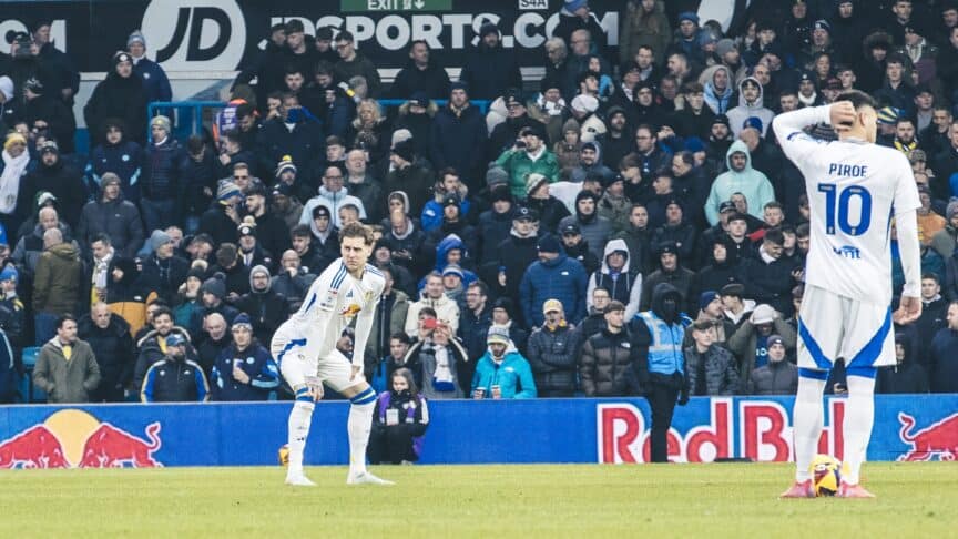 Joe Rodon standing, hands on knees, arse jutting out, looking for the next player to tackle