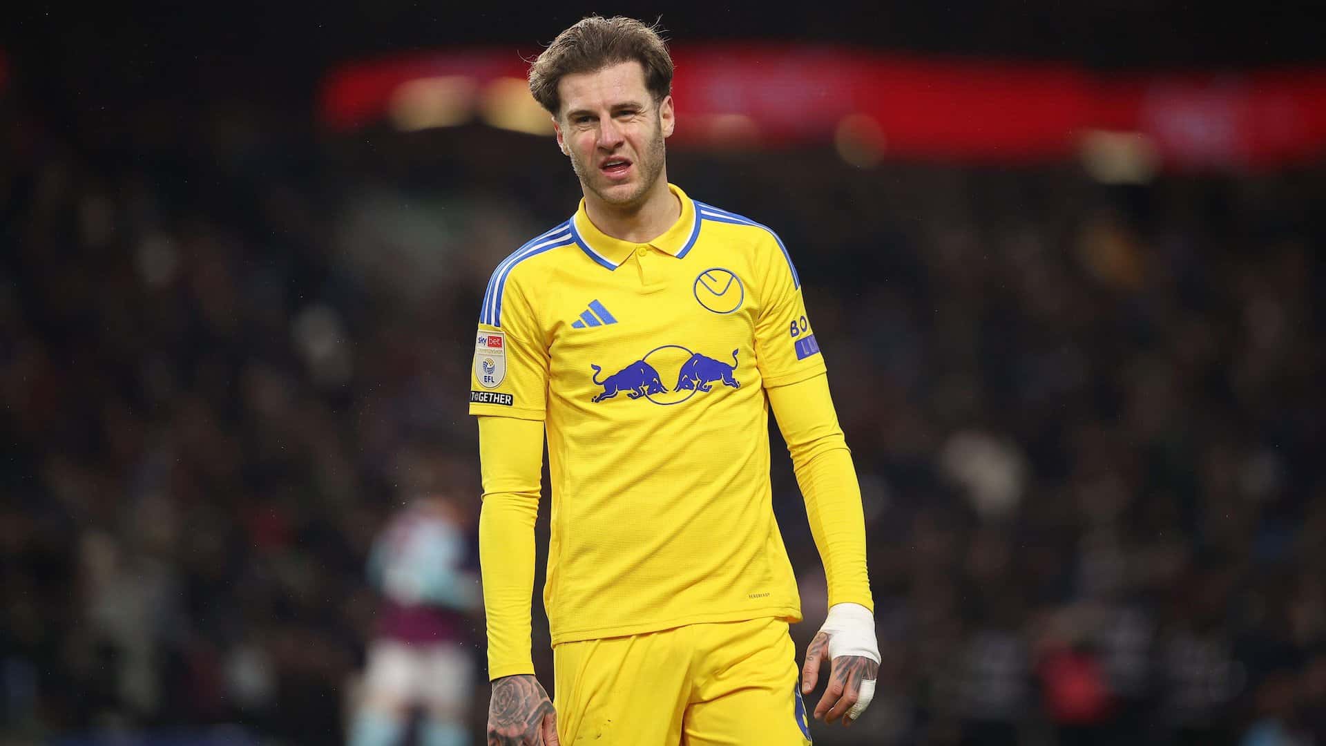 Joe Rodon in the yellow away shirt at Burnley, scowling, obviously, because he's always scowling