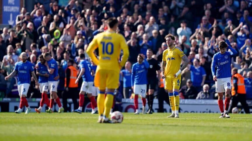 Joe Rodon pulls a big daft face after Cardiff's opener while Joel Piroe waits to take the kick off