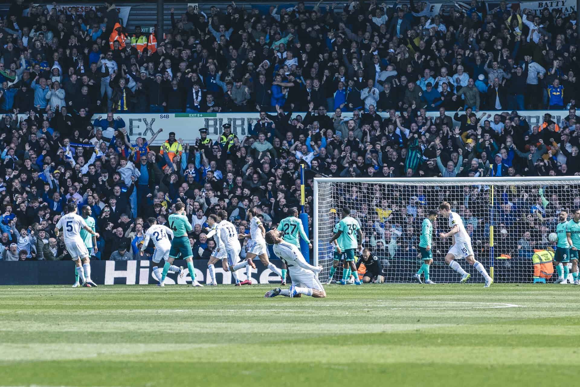Jayden Bogle sinks to his knees, presumably as astonished as the rest of us, after James Justin opens the scoring with an overhead kick against Wolves