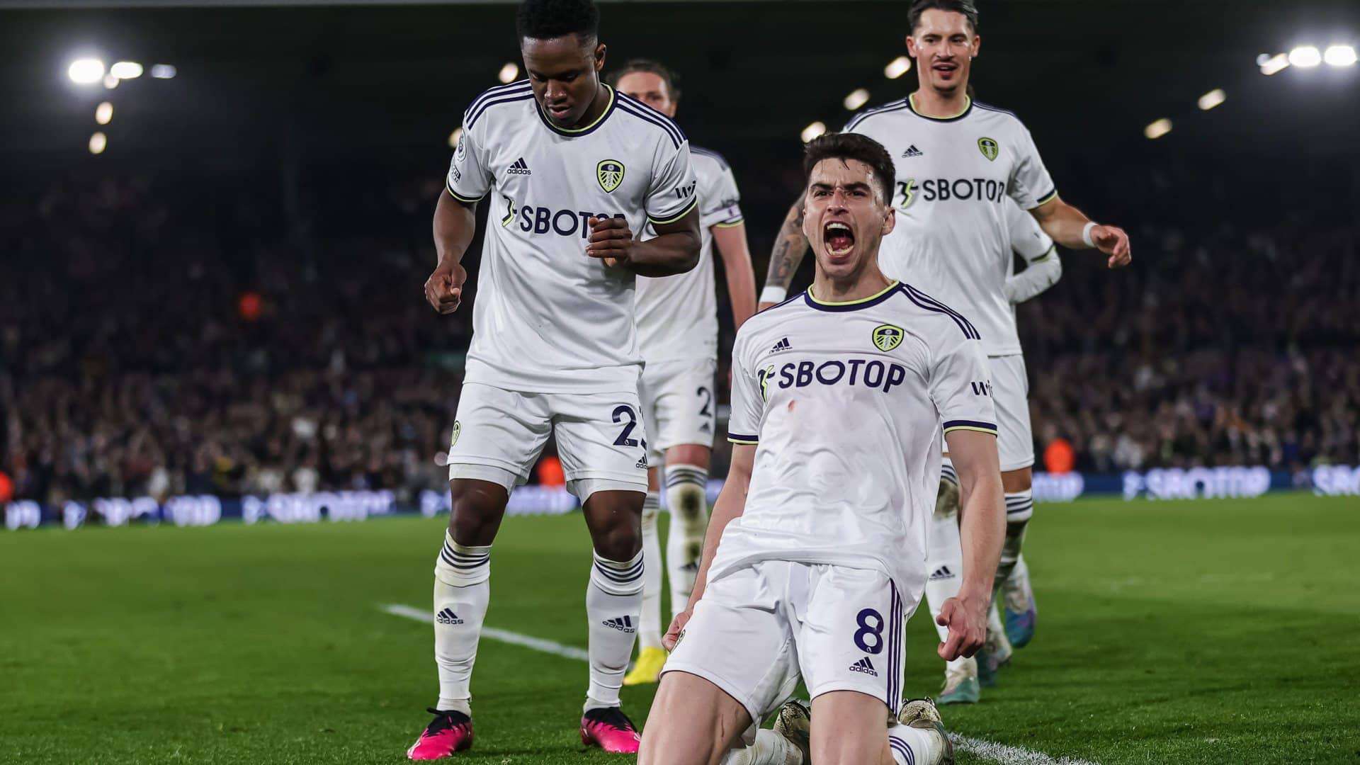 Luis Sinisterra doing a dance, Marc Roca on his knees shouting, Leeds have scored a goal haven't they