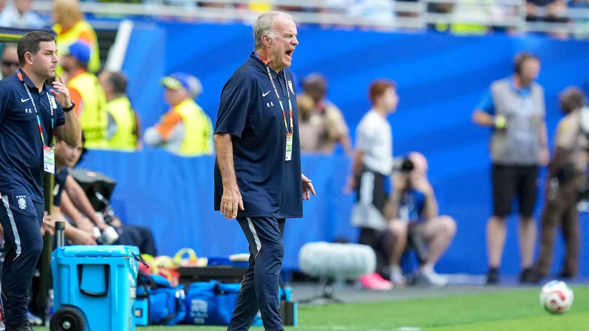Marcelo Bielsa standing on the touchline during Uruguay's draw with Cape Verde, screaming at his players/the ghost of Luis Suarez