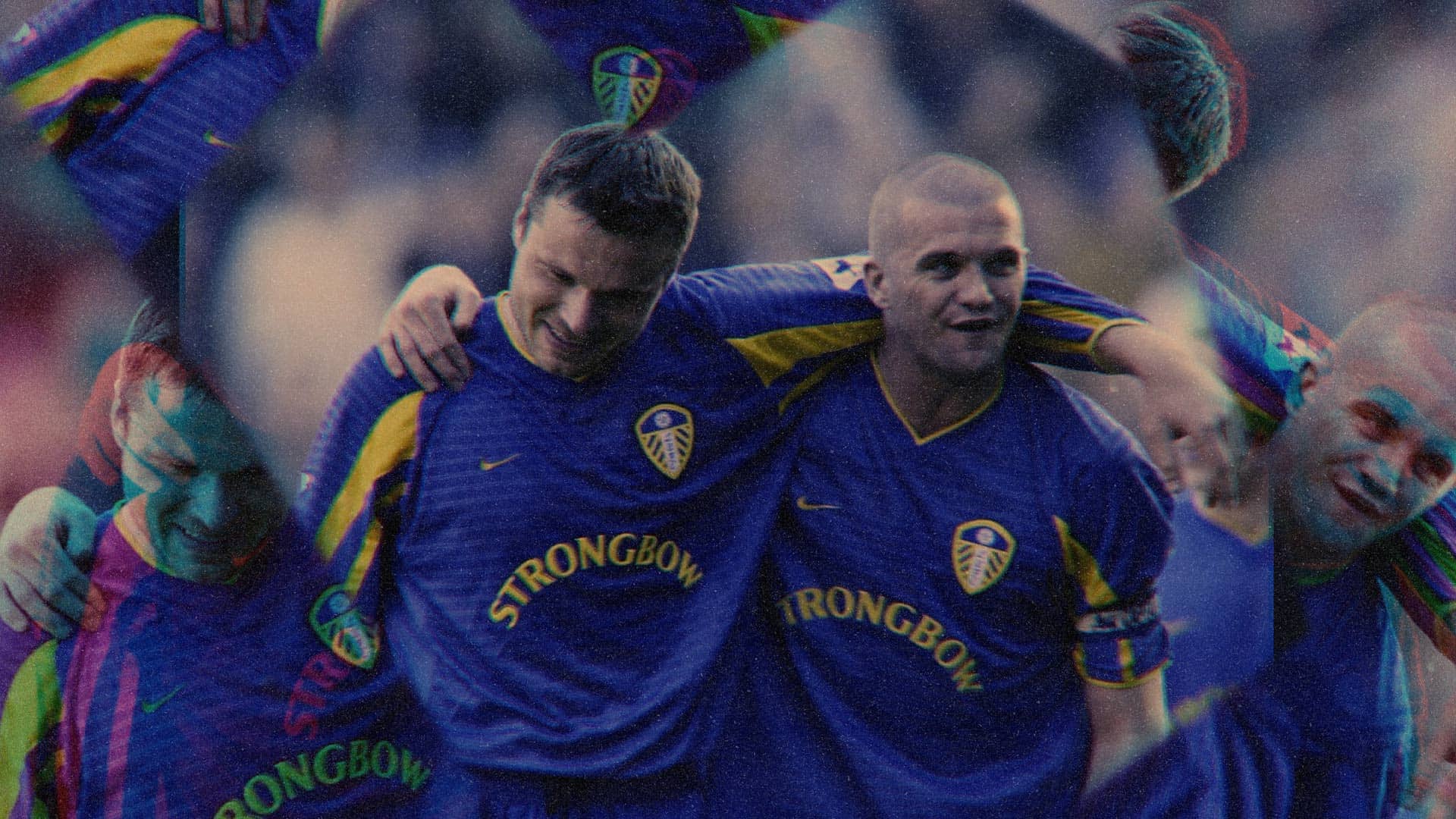 Marko Viduka and Dom Matteo celebrating a goal together for Leeds United