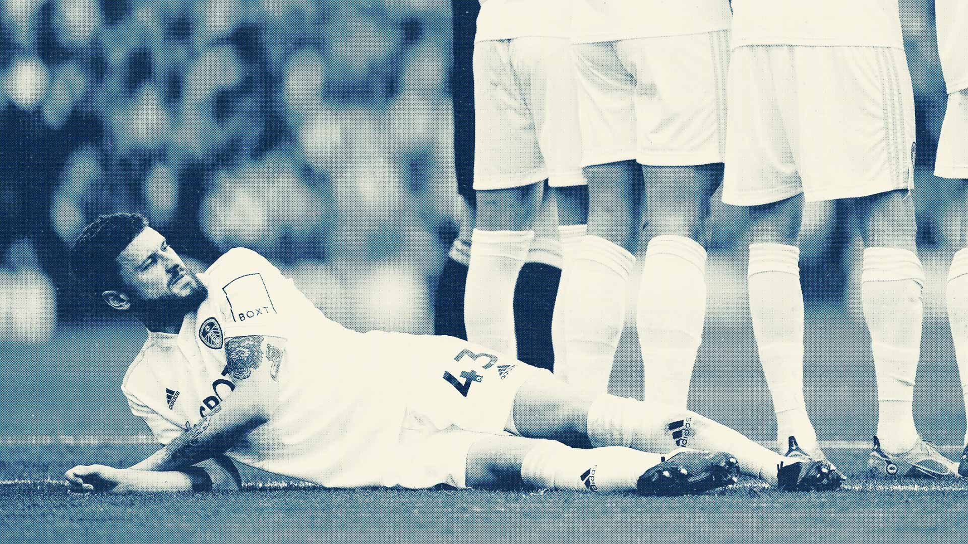 Mateusz Klich, so cool he's horizontal (lying down behind a defensive wall)