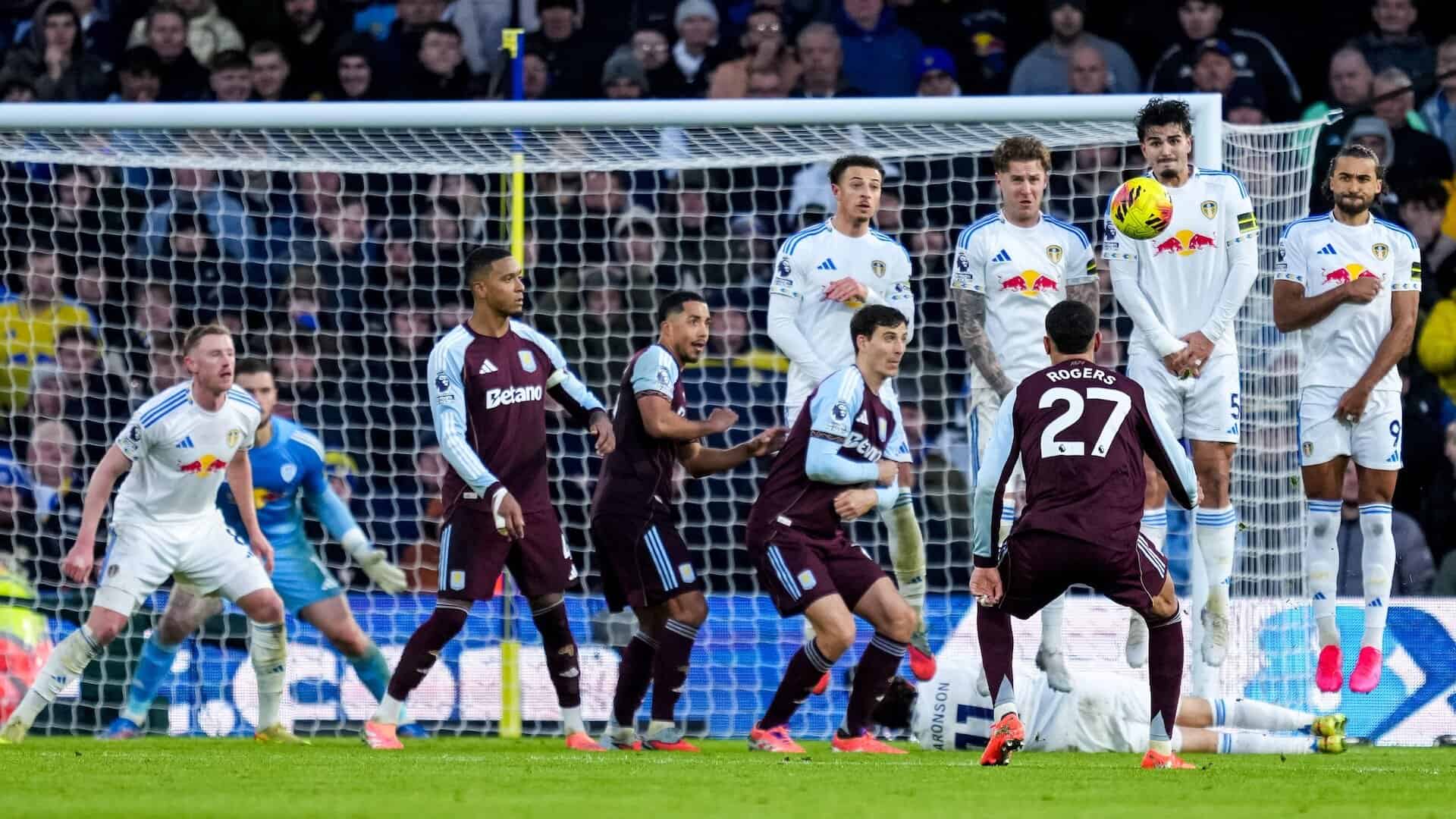 Morgan Rogers hits a free-kick and watches it hit the middle of Leeds United's net. Lucas Perri is there, somewhere, making himself as small as possible. FFS!