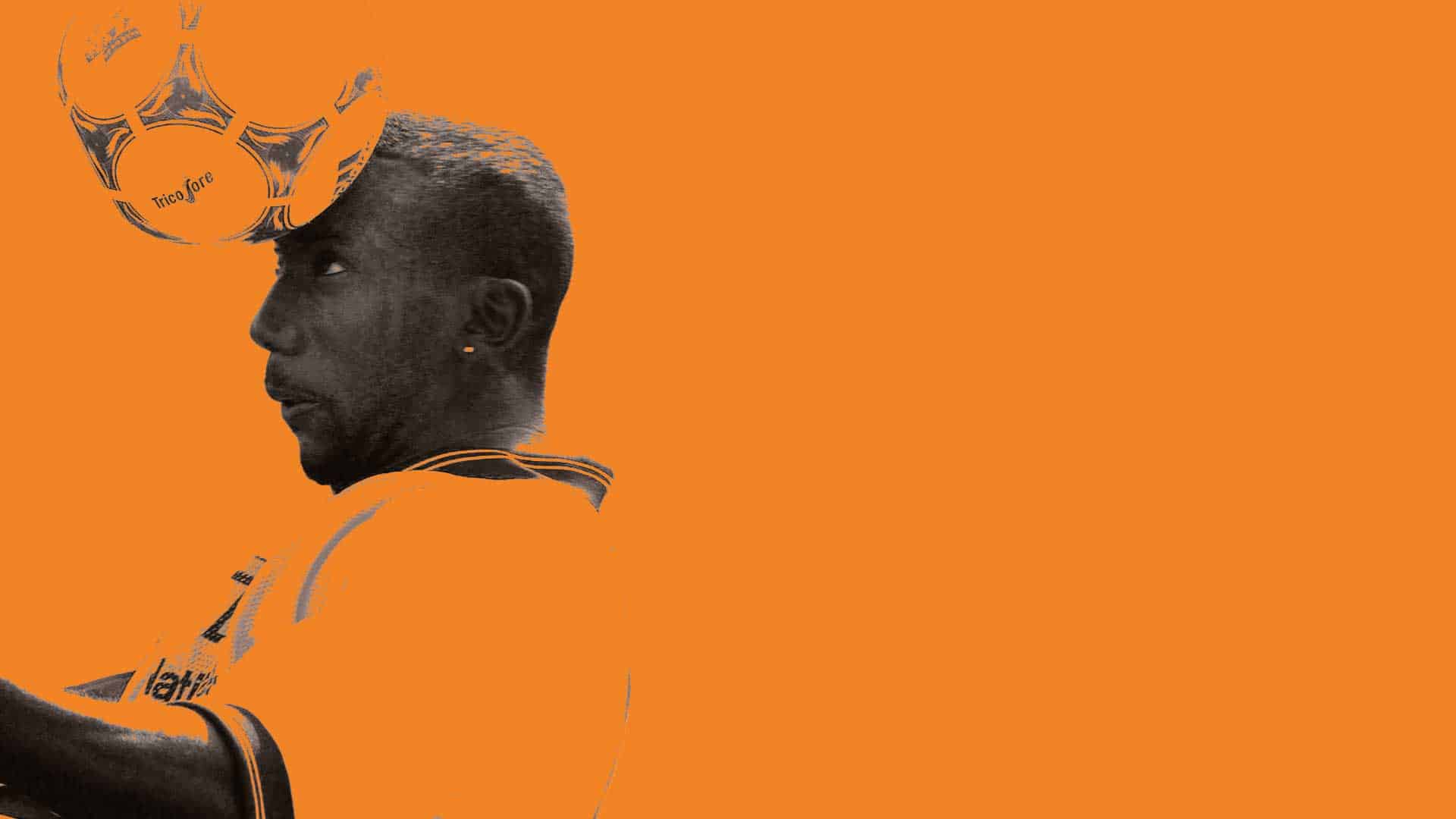 Jimmy Floyd Hasselbaink concentrating very hard on heading a football