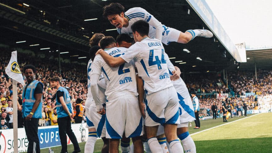 Leeds' players celebrate the second, decisive goal in their 2-1 win against Preston.