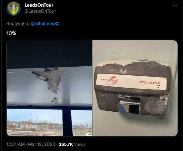 A tweet of two photos of the inside of Elland Road: paint falling off the ceiling and a hand dryer with paint completely stripped off