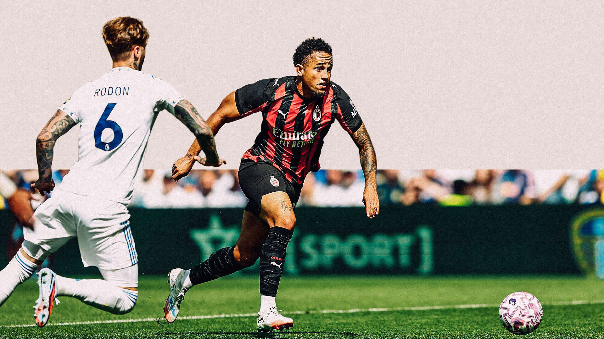 Noah Okafor dribbling against Joe Rodon in Leeds' friendly against Milan. Isaac Schmidt is nowhere to be seen