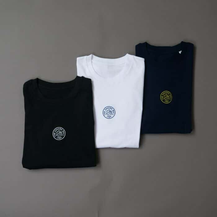 All three of our embroidered logo t-shirts together in black, white and navy