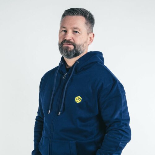 Our favourite Norwegian Svein photographed in our navy zip-up hoodie, featuring the TSB icon embroidered in blue and yellow