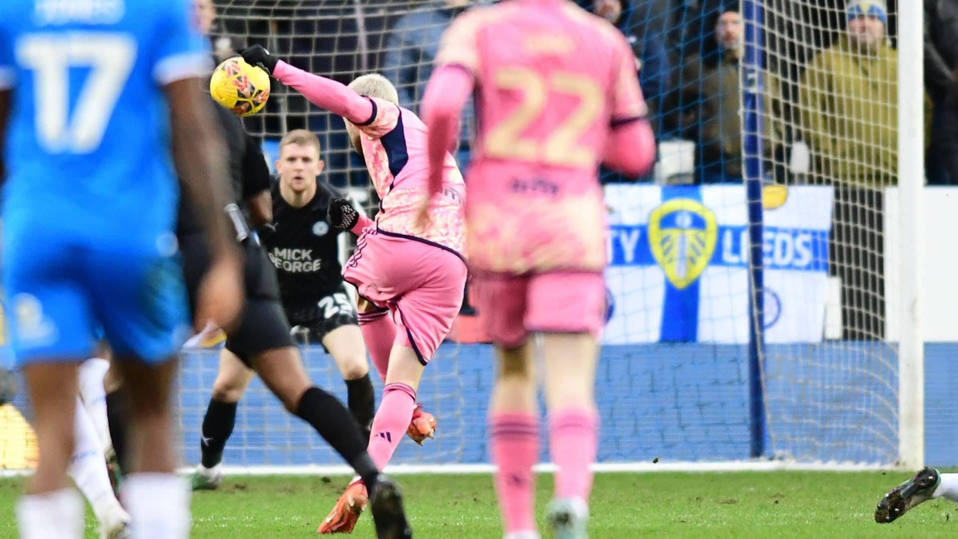 A view from behind Archie Gray as, up the field, the ball leaves Pat Bamford's foot — we see him from the back immediately apres volley — on its way to wondergoal status in Peterborough's top corner